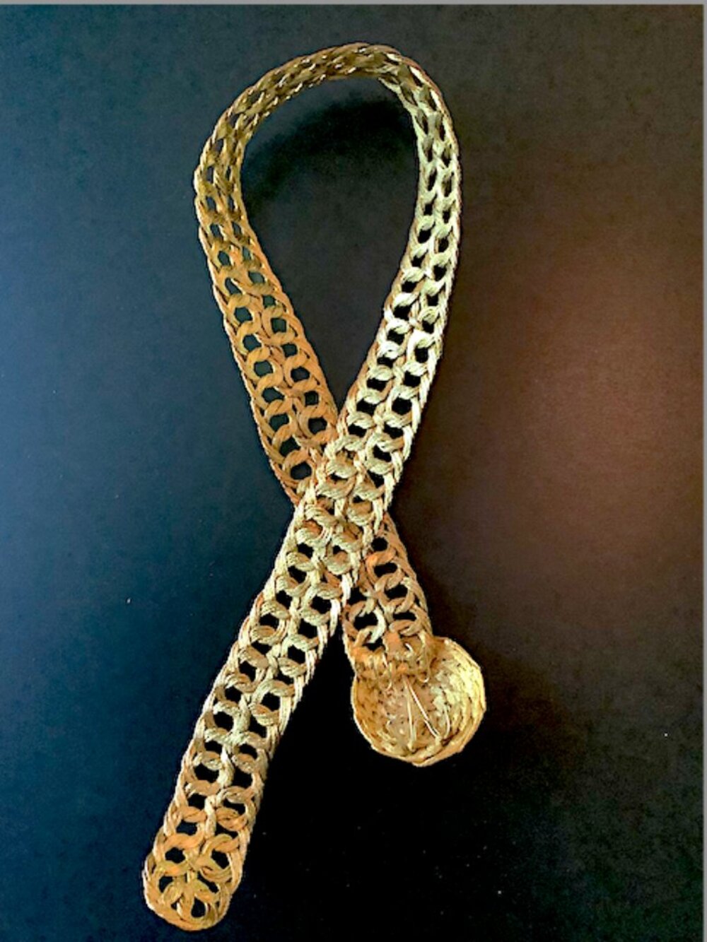 Gold wire mesh belt, 32 inch long x 1 1/2inch wide, with a round buckle